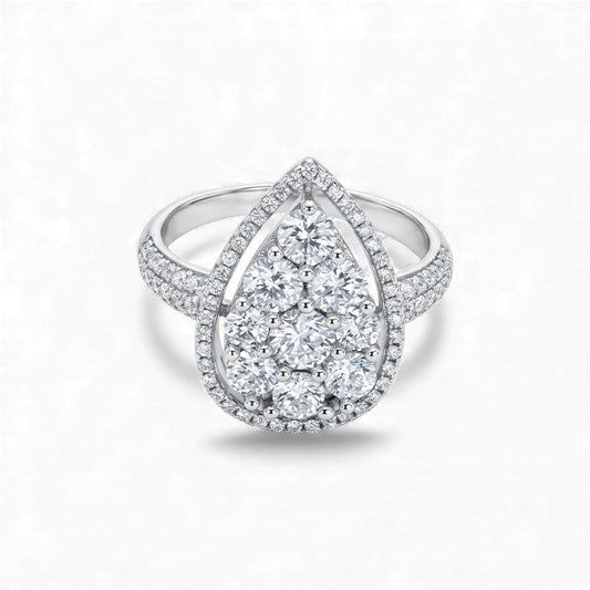 Silver ring with diamond accents on a white background