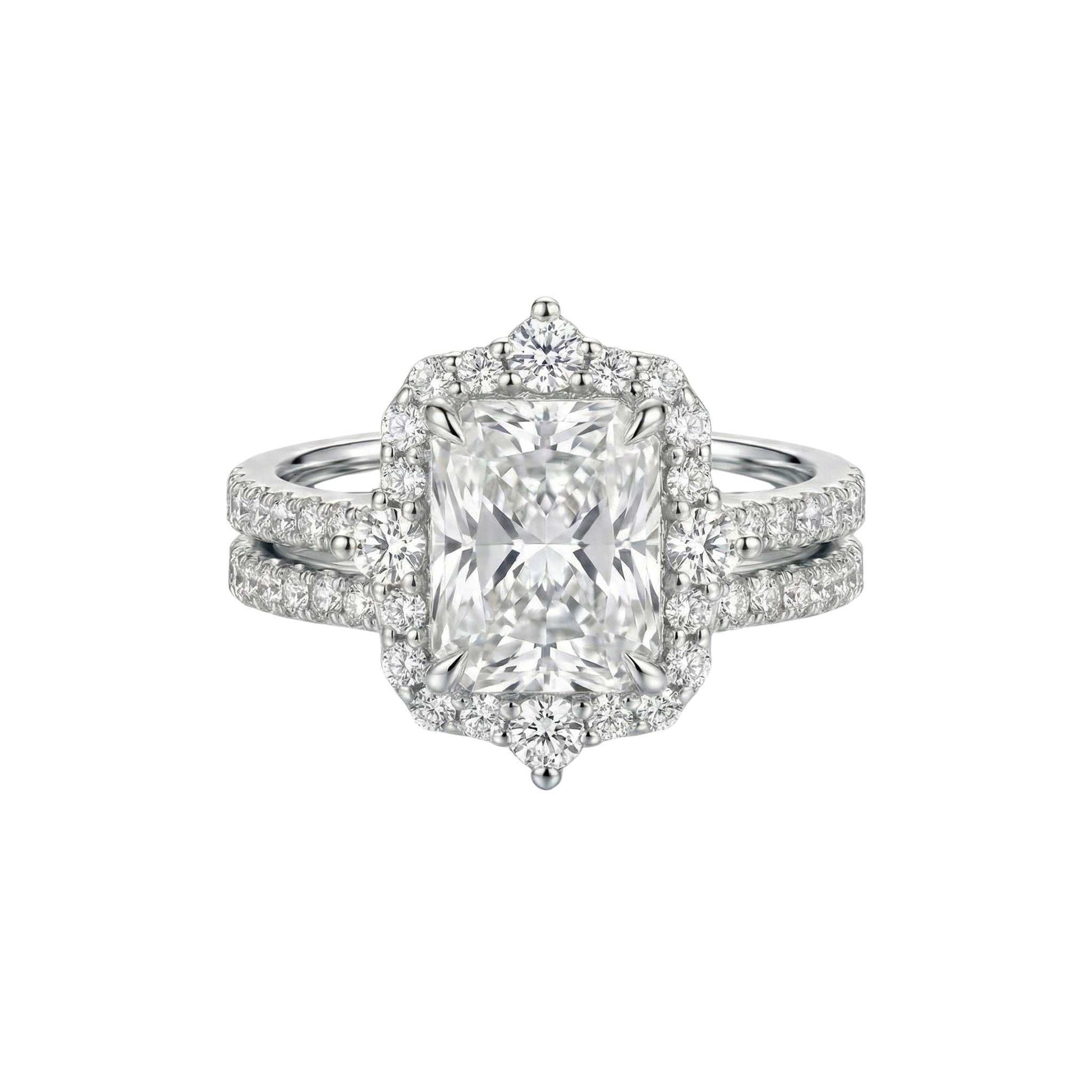 Diamond ring with a central gemstone and smaller stones on a white background