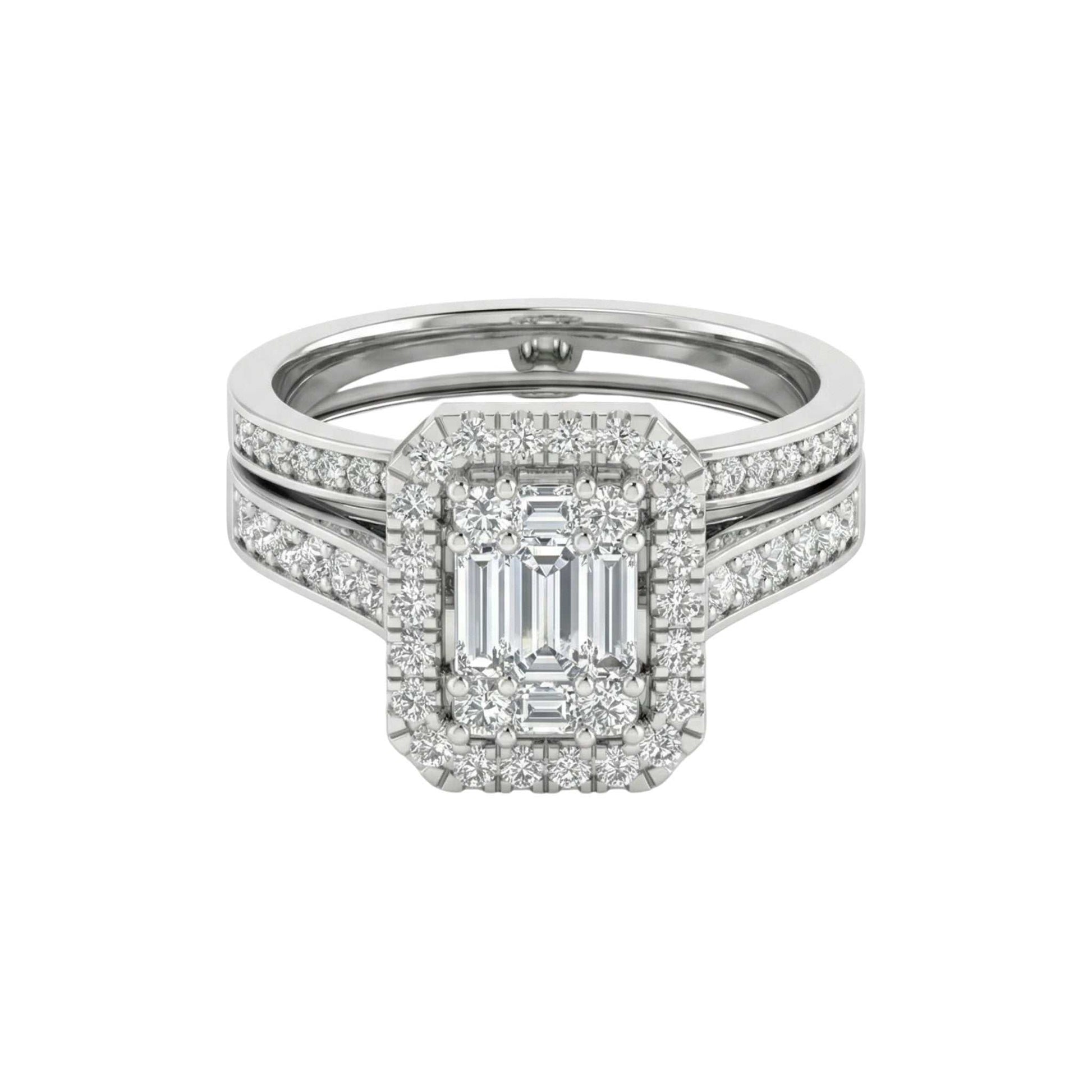 Diamond ring with emerald-cut center stone on a white background