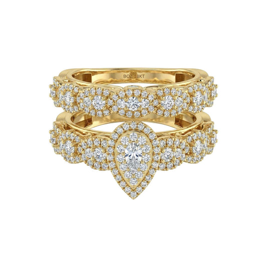 18KT gold bridal set with pear cut diamond cluster and matching diamond-studded band ring