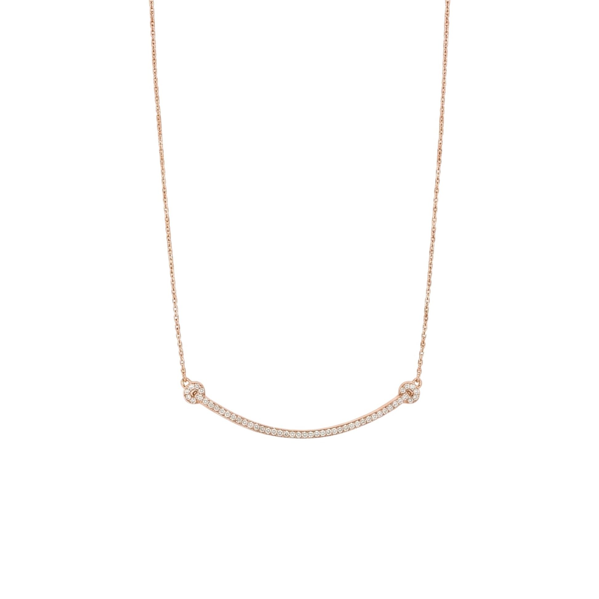 Rose gold necklace on a white background