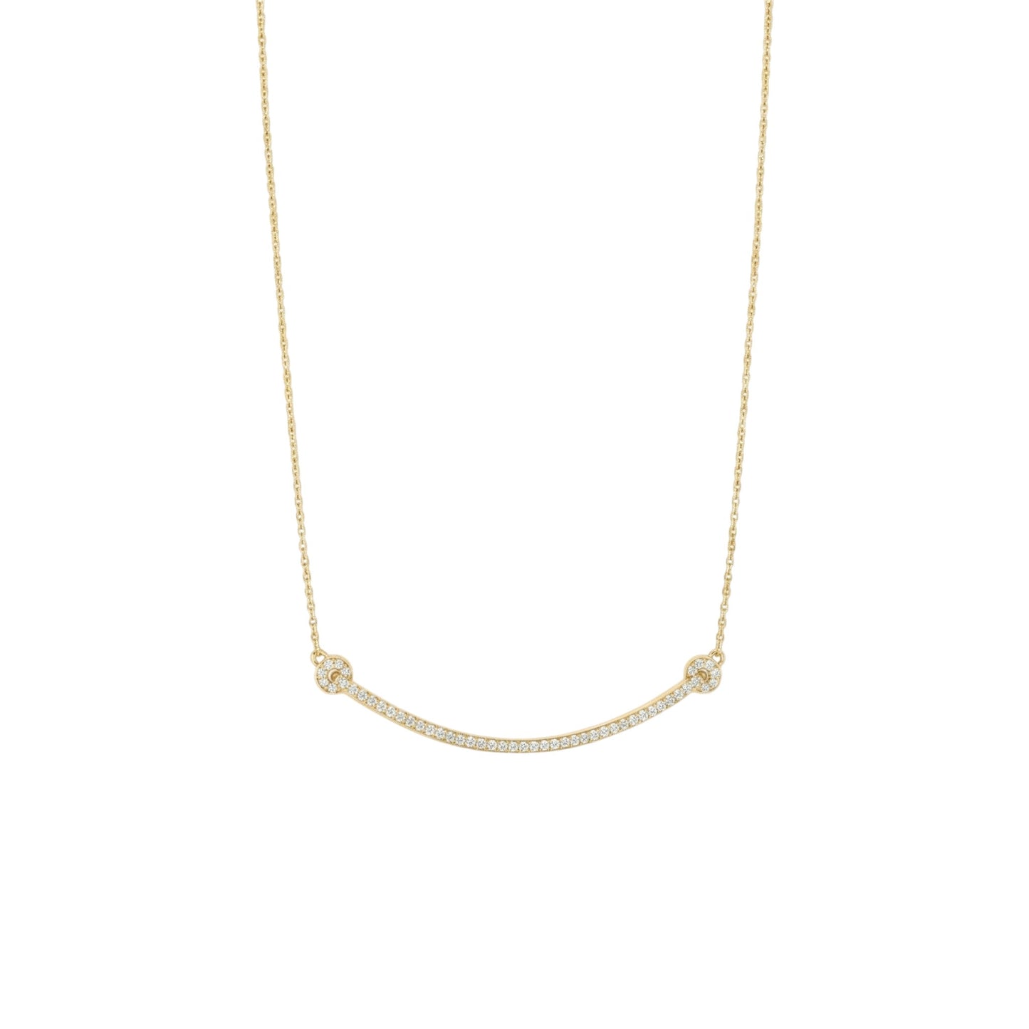 Gold necklace with small beads on a white background