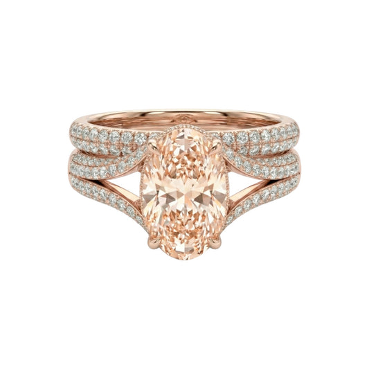 Rose gold ring with a large central gemstone and smaller stones on a white background