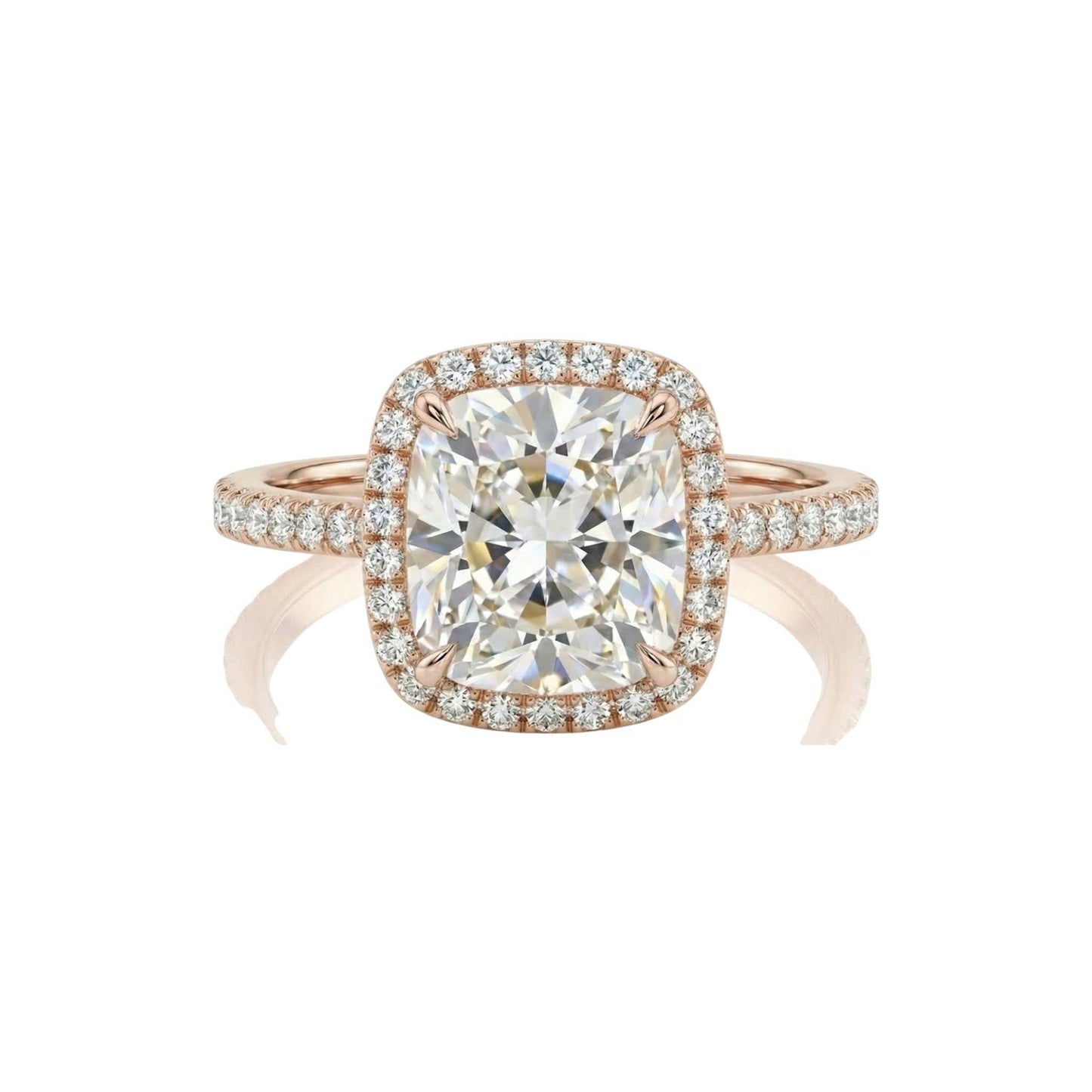 Rose gold ring with a large diamond and smaller diamonds on the band against a white background