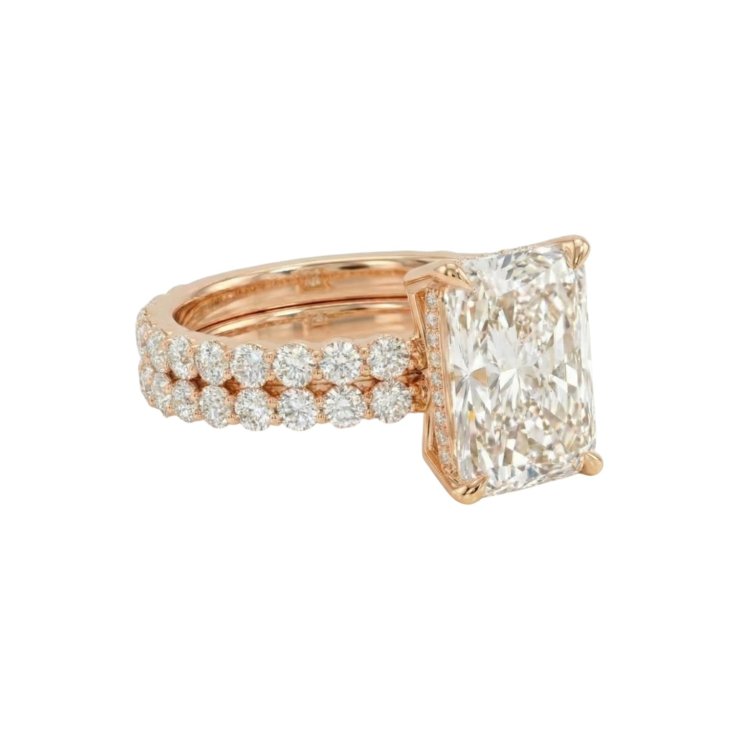 Rose gold ring with a large diamond and smaller diamonds on the band against a white background