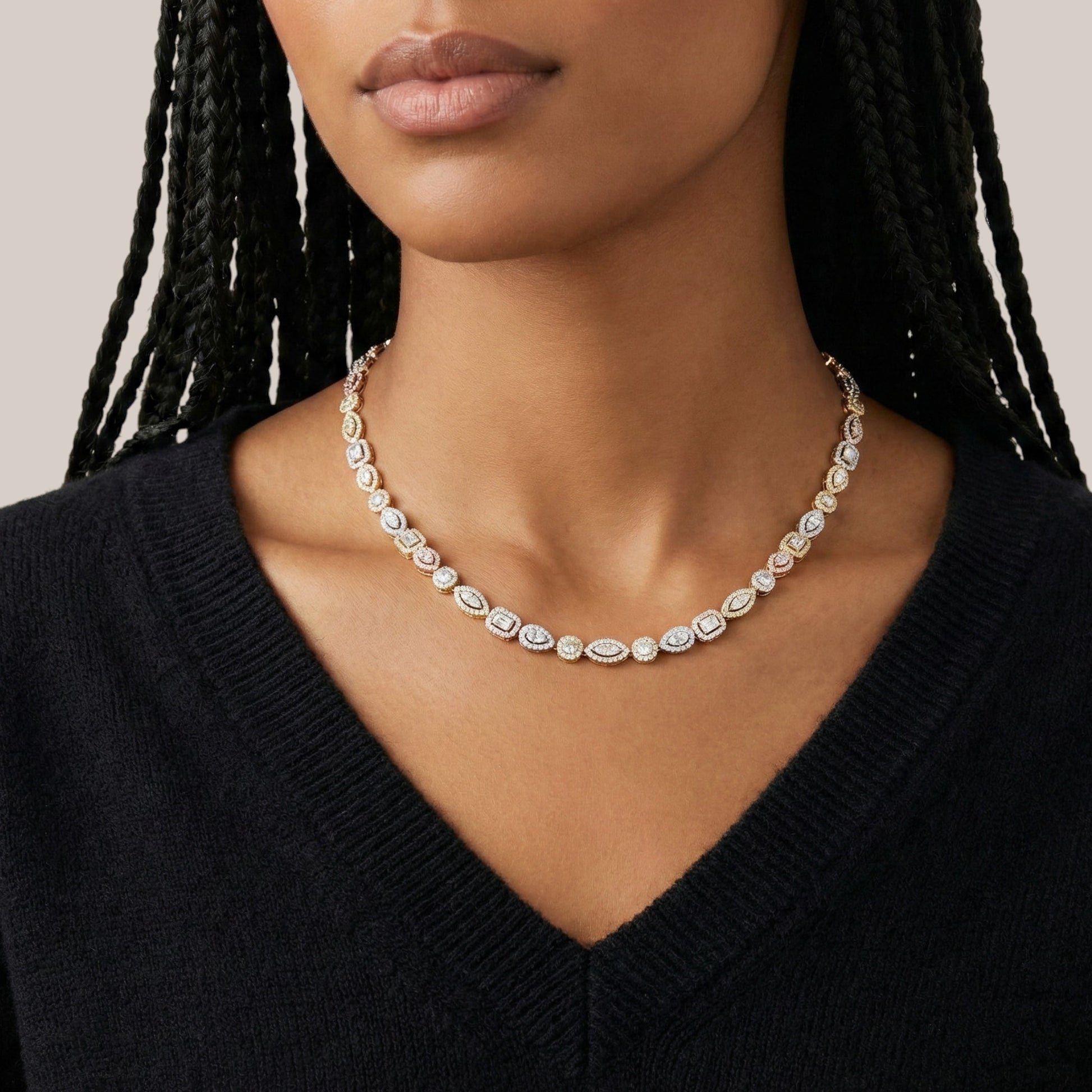 Pearl necklace worn by a model against a neutral background