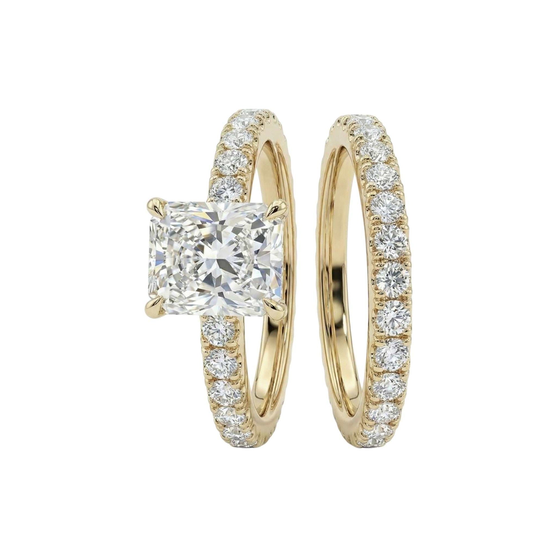 Gold ring with a square-cut diamond and matching hoop earring on a white background