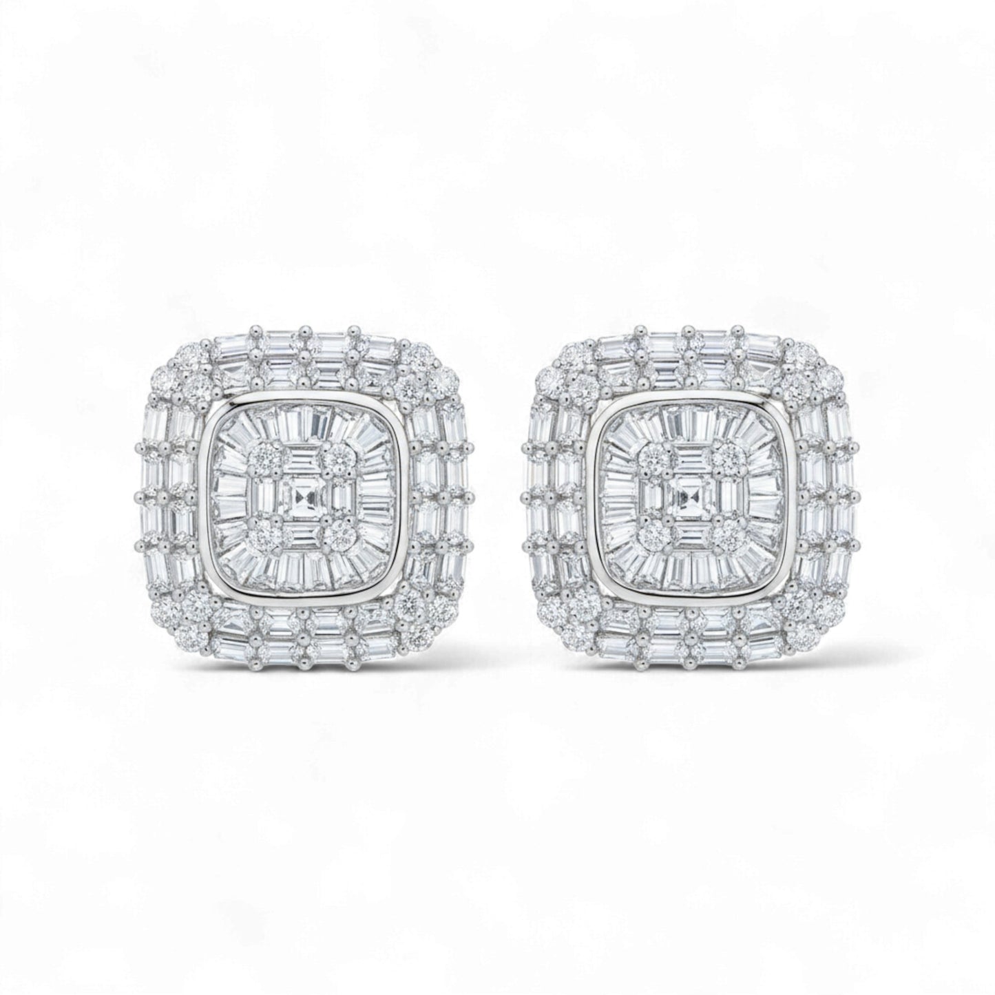 Pair of diamond earrings on a white background