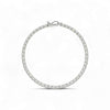 Silver bracelet with clear stones on a white background