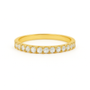 Gold ring with small diamonds on a white background