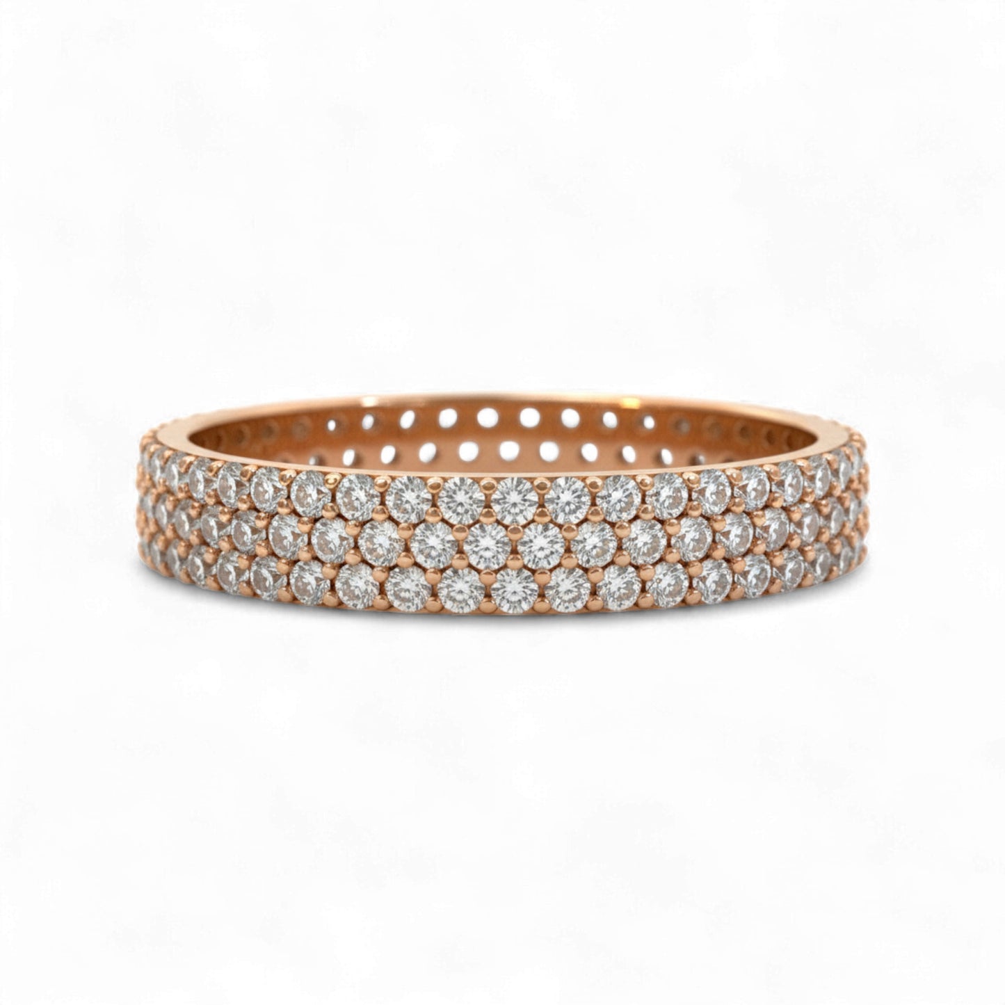 Rose gold bracelet with clear gemstones on a white background