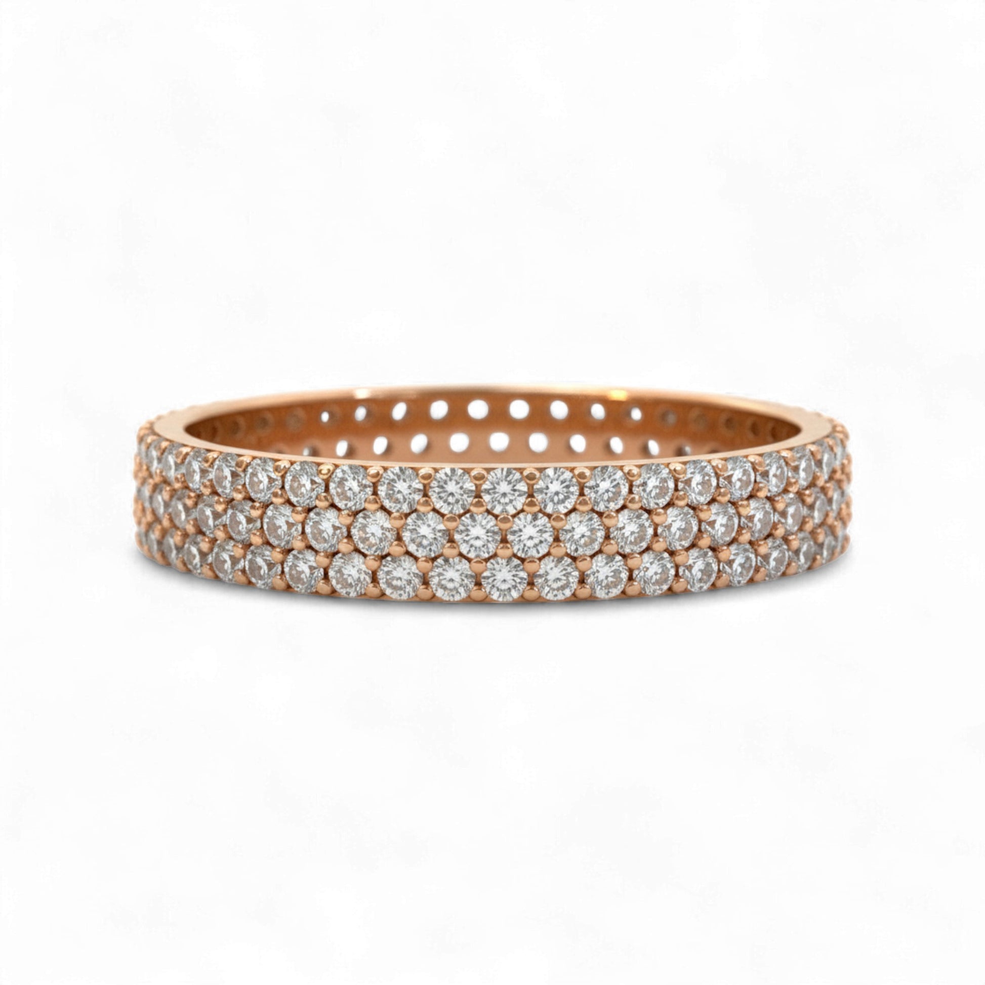 Rose gold bracelet with clear gemstones on a white background