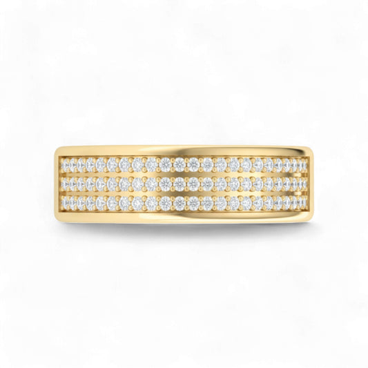 Gold ring with diamond accents on a white background