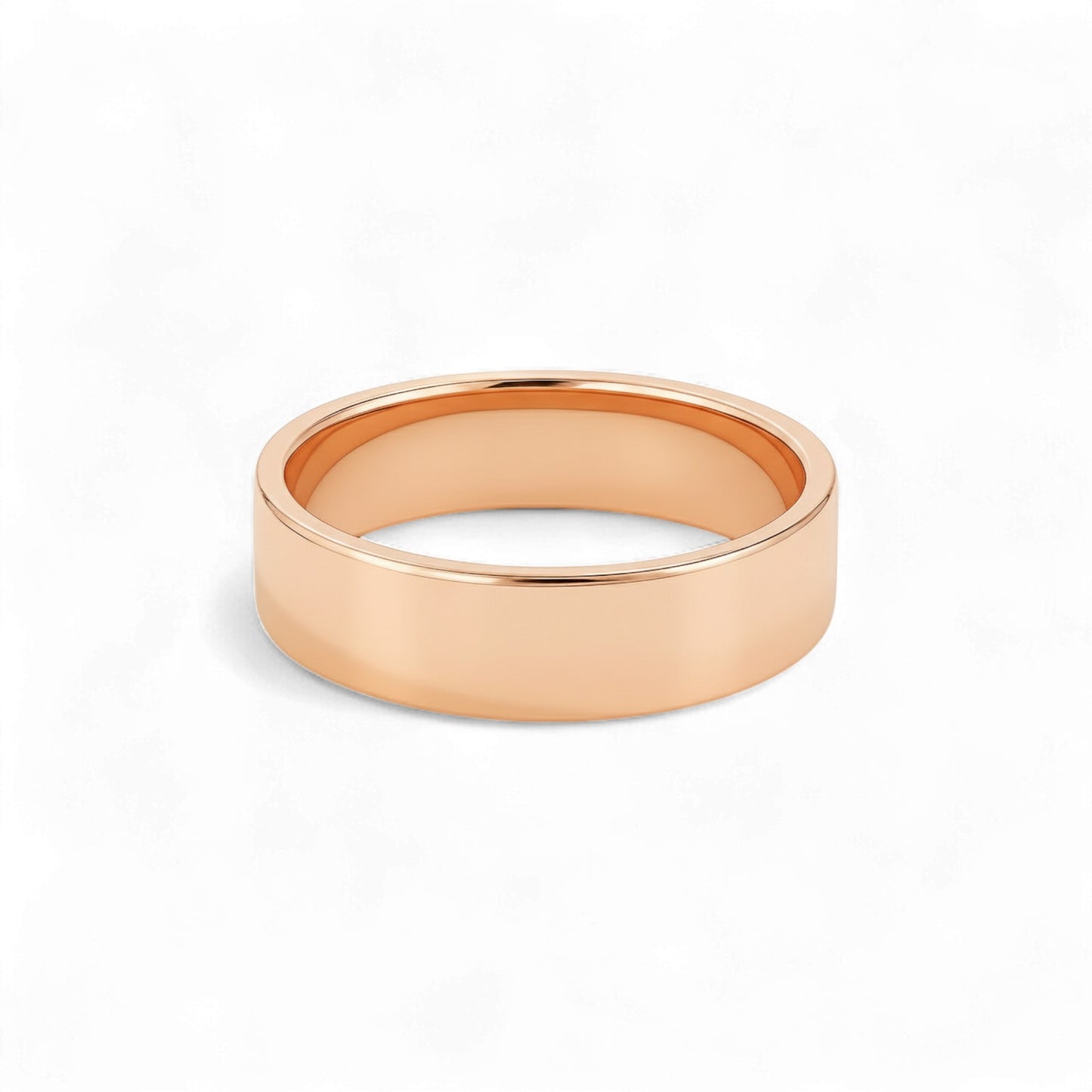 Rose gold ring on a white background
