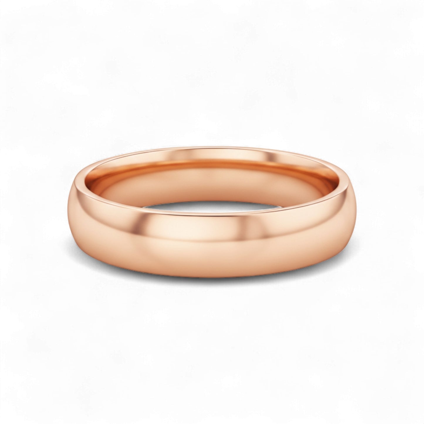 Rose gold ring on a white background