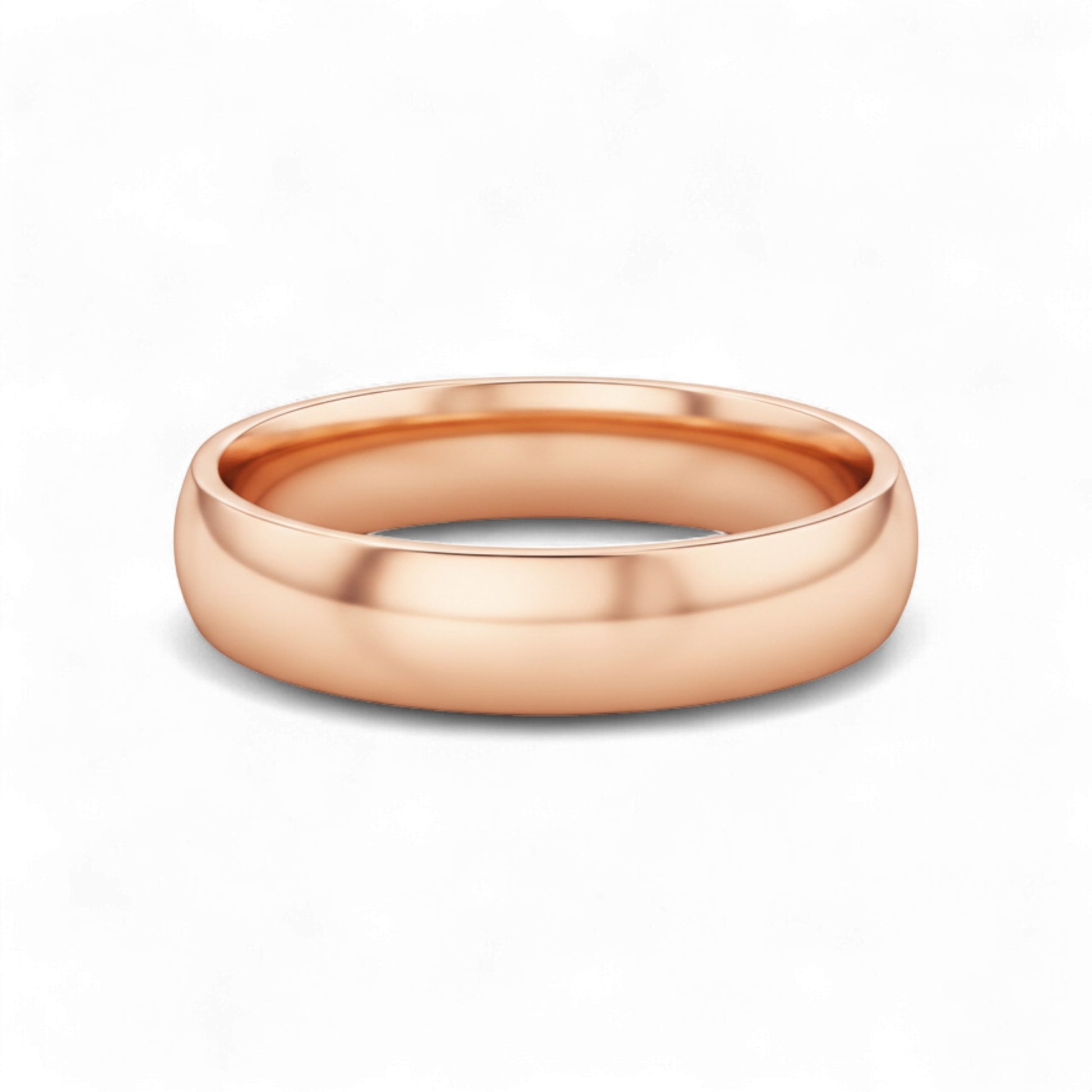 Rose gold ring on a white background