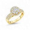 Gold ring with diamond accents on a white background