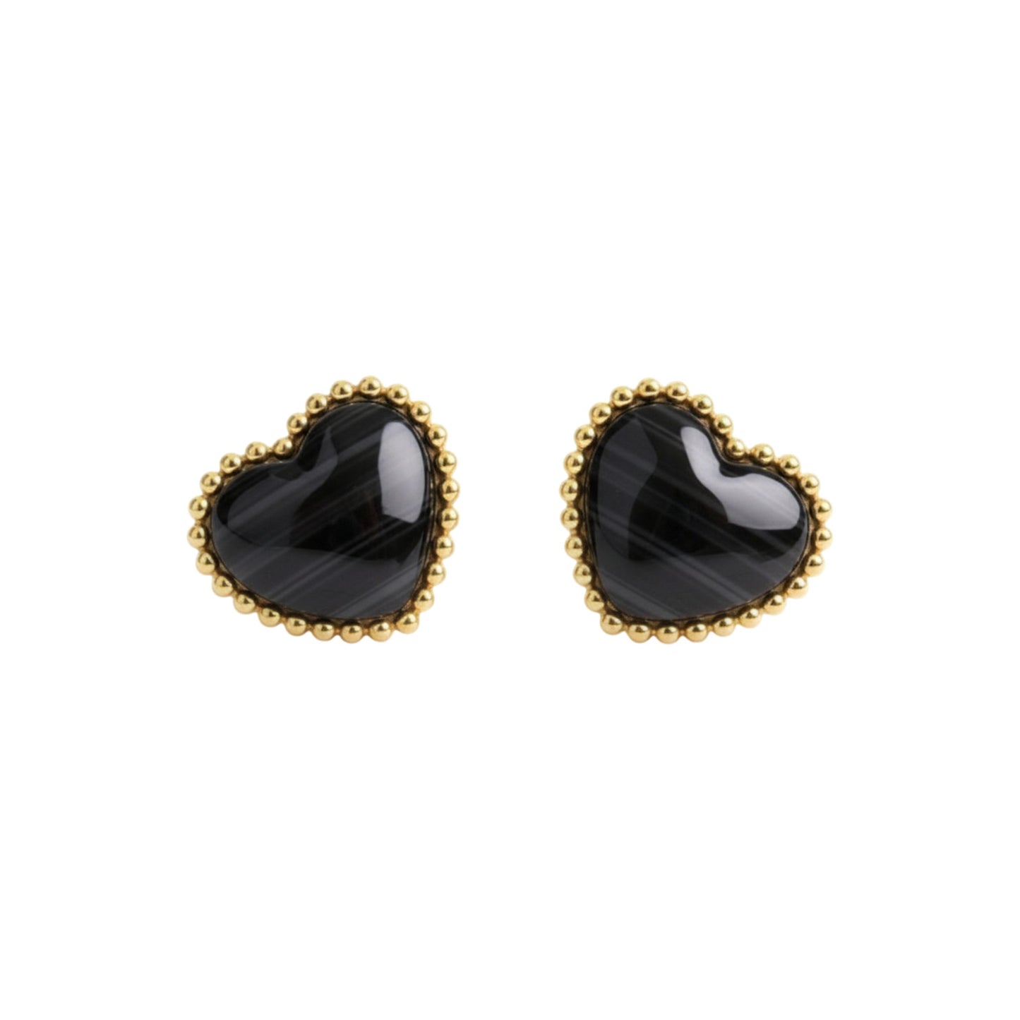 Heart-shaped black earrings with gold rims on a white background
