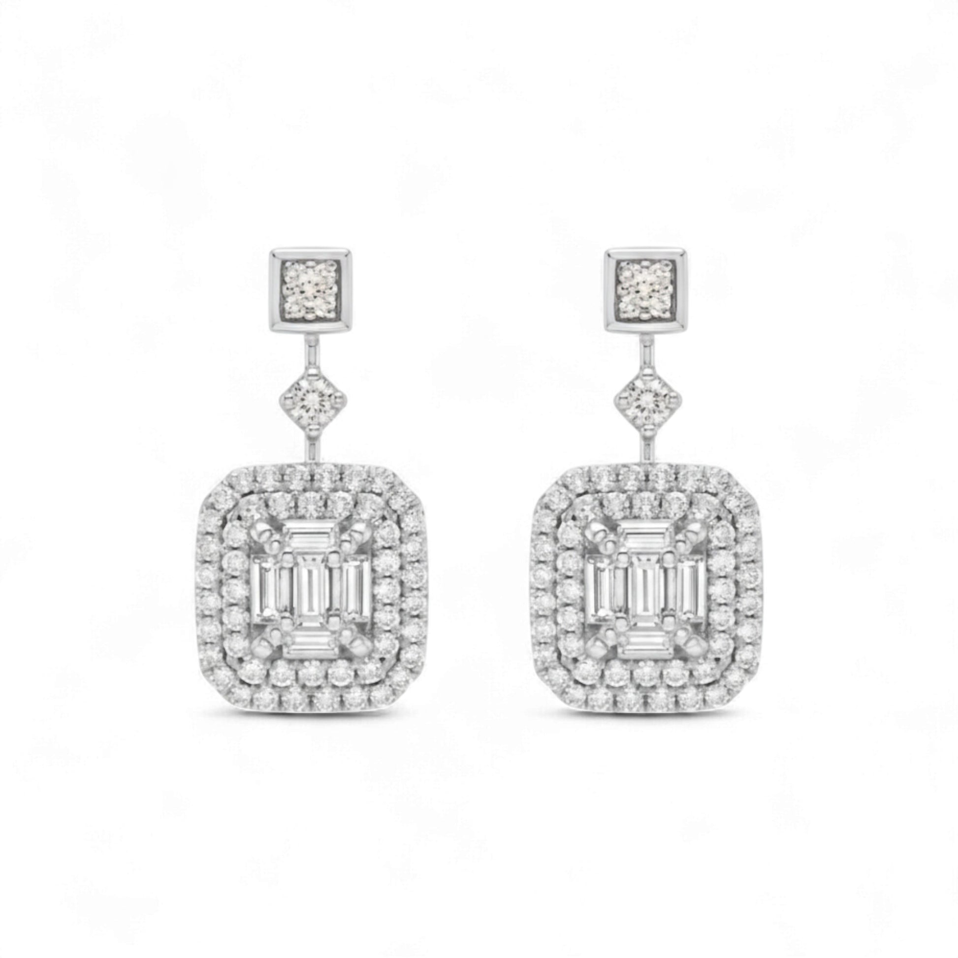 Pair of diamond earrings on a white background