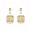 Gold earrings with square designs and clear gemstones on a white background