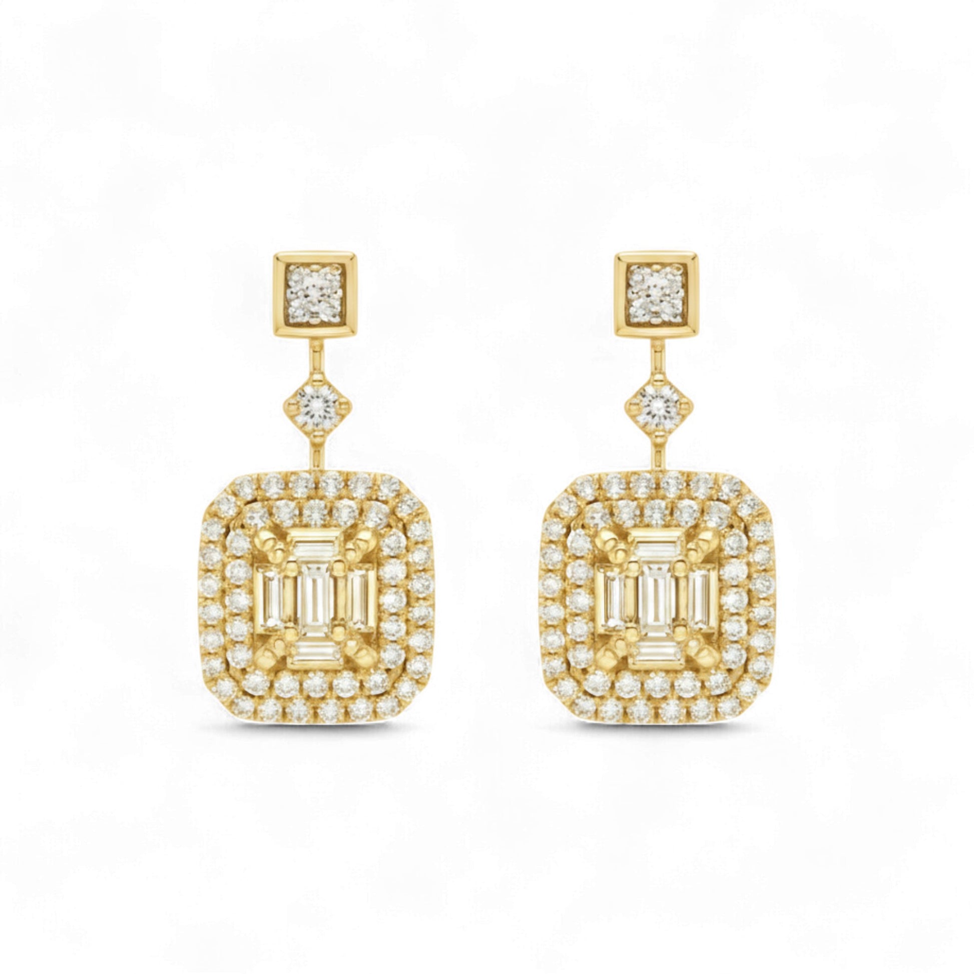 Gold earrings with square designs and clear gemstones on a white background