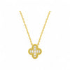 Gold necklace with a diamond-encrusted cross pendant on a white background