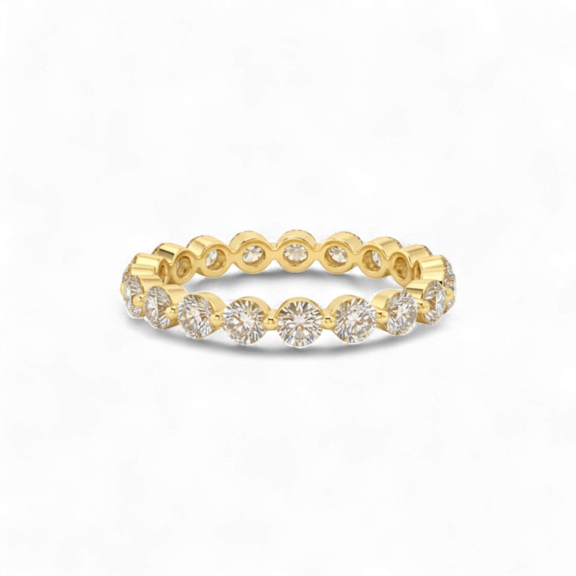 Gold ring with diamonds on a white background