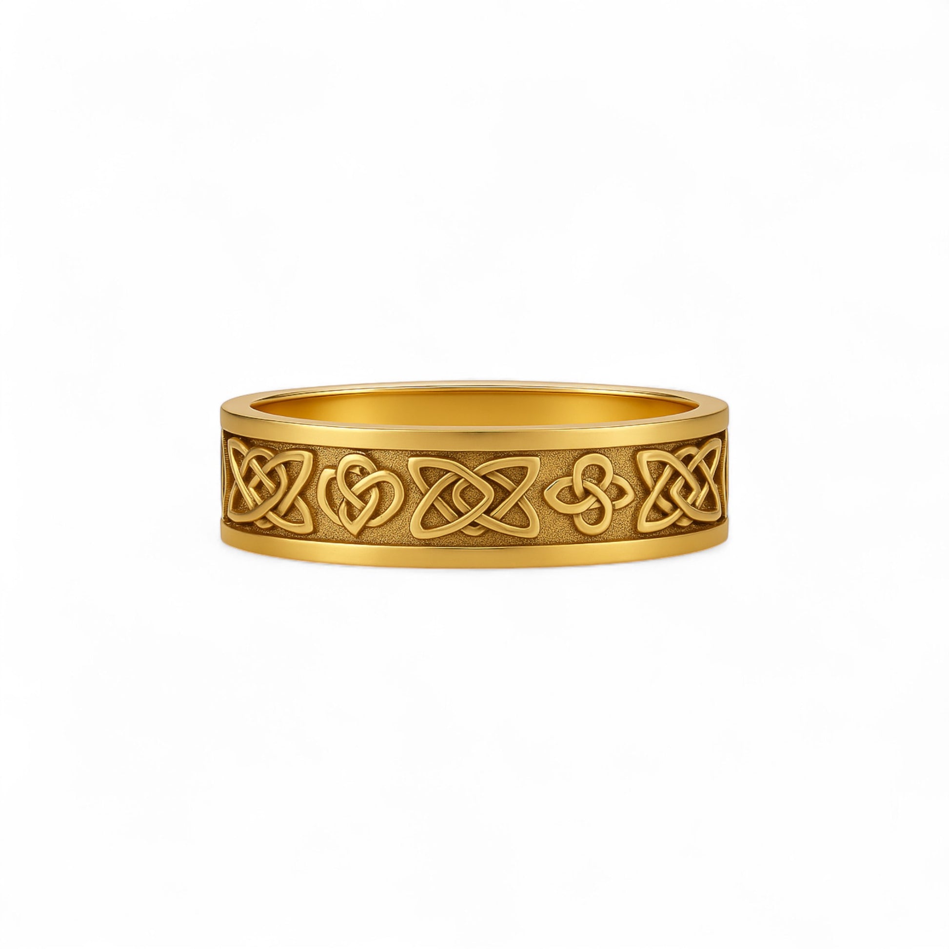 Gold ring with Celtic knot design on a white background