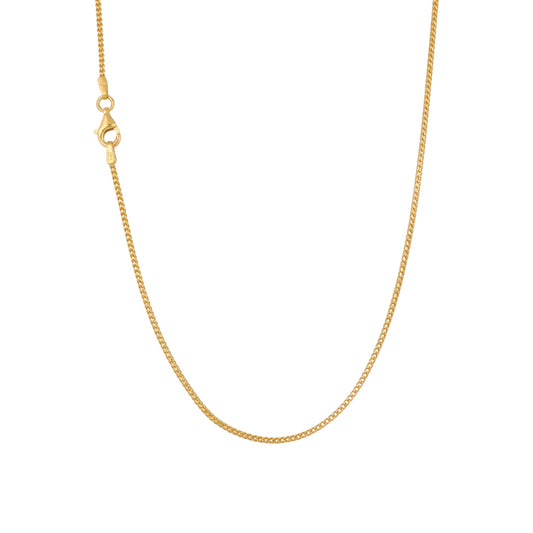 Gold chain necklace on a white background