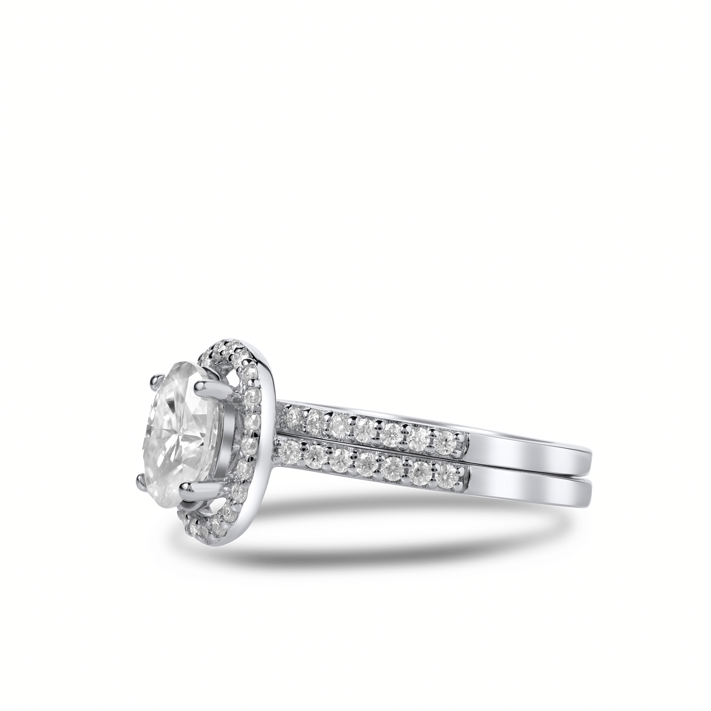 Diamond ring with a halo and side stones on a white background