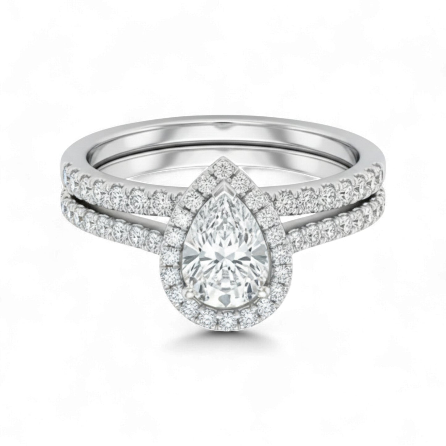 Diamond ring with pear-shaped center stone on a white background