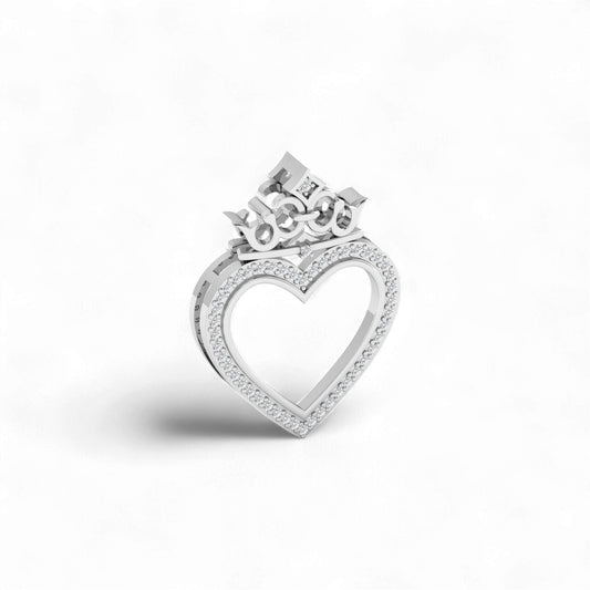 Silver heart-shaped ring with a crown-like top on a white background