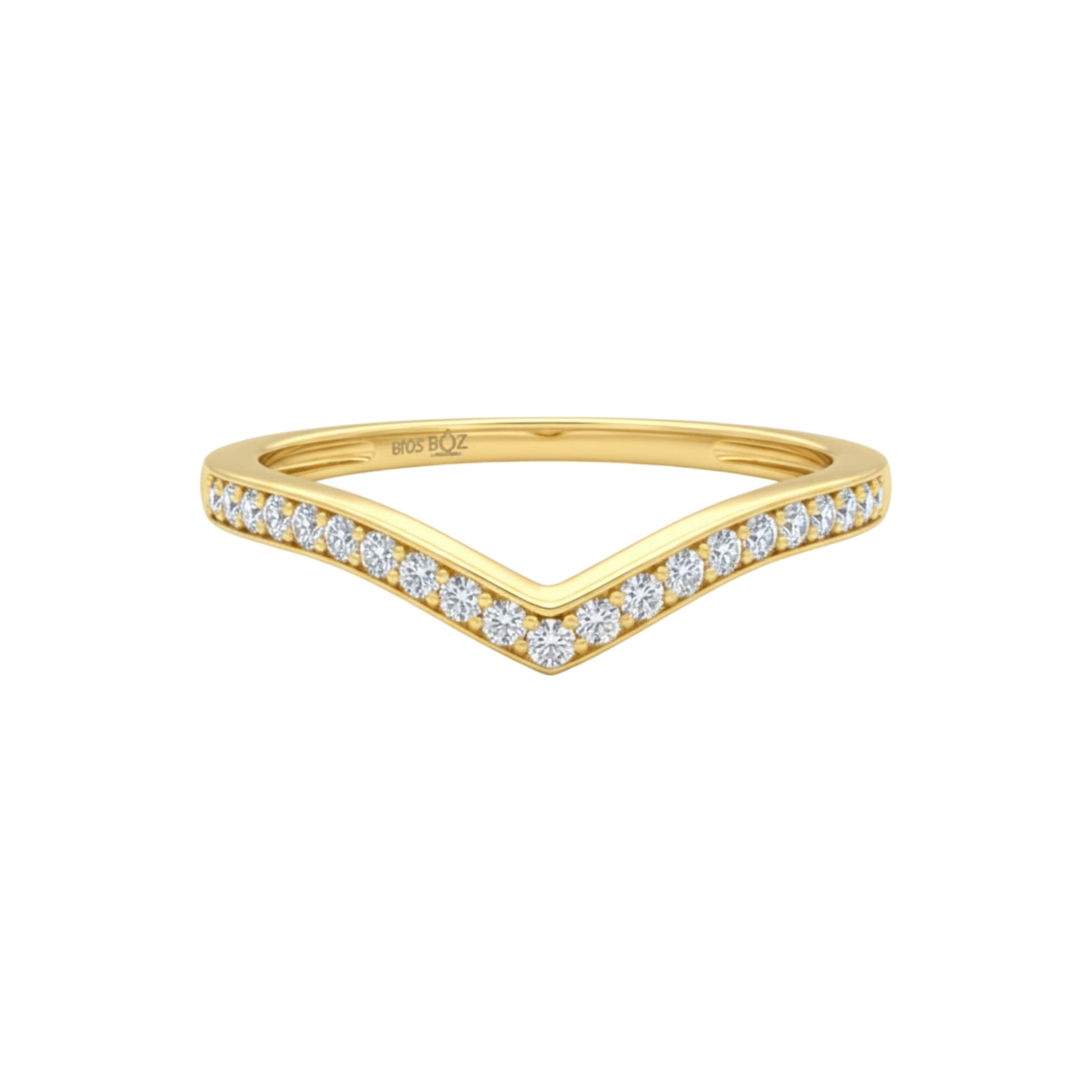 Gold ring with diamond accents on a white background