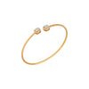 Gold bracelet with two diamond-studded ends on a white background