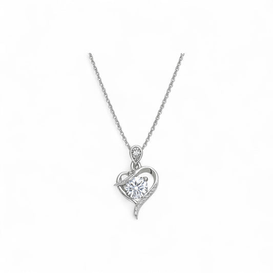 Silver heart-shaped pendant necklace on a white background