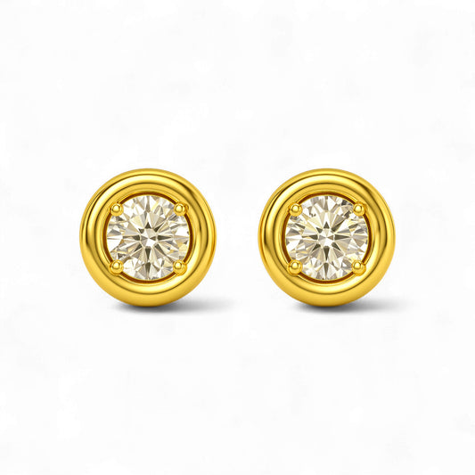 Gold earrings with round gemstones on a white background