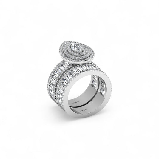 Silver ring with diamond accents on a white background