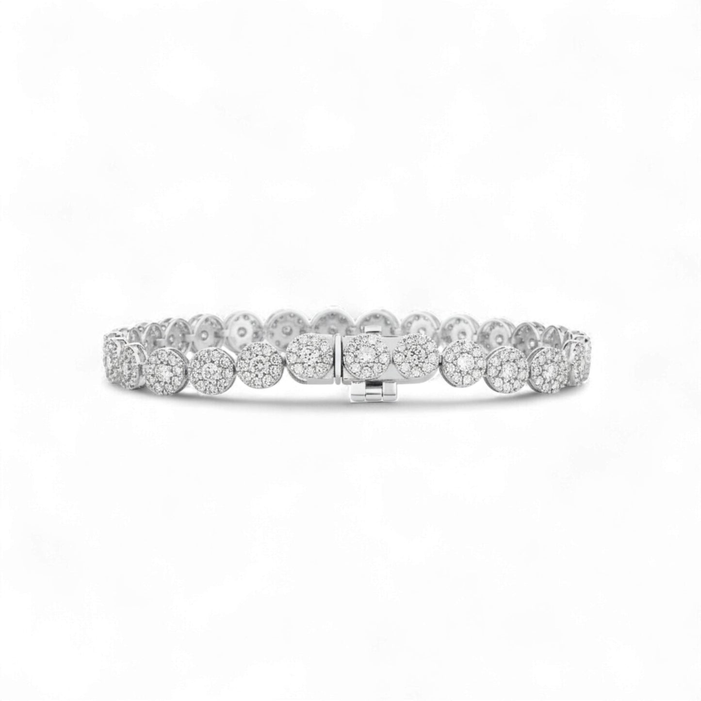 Silver bracelet with clear stones on a white background