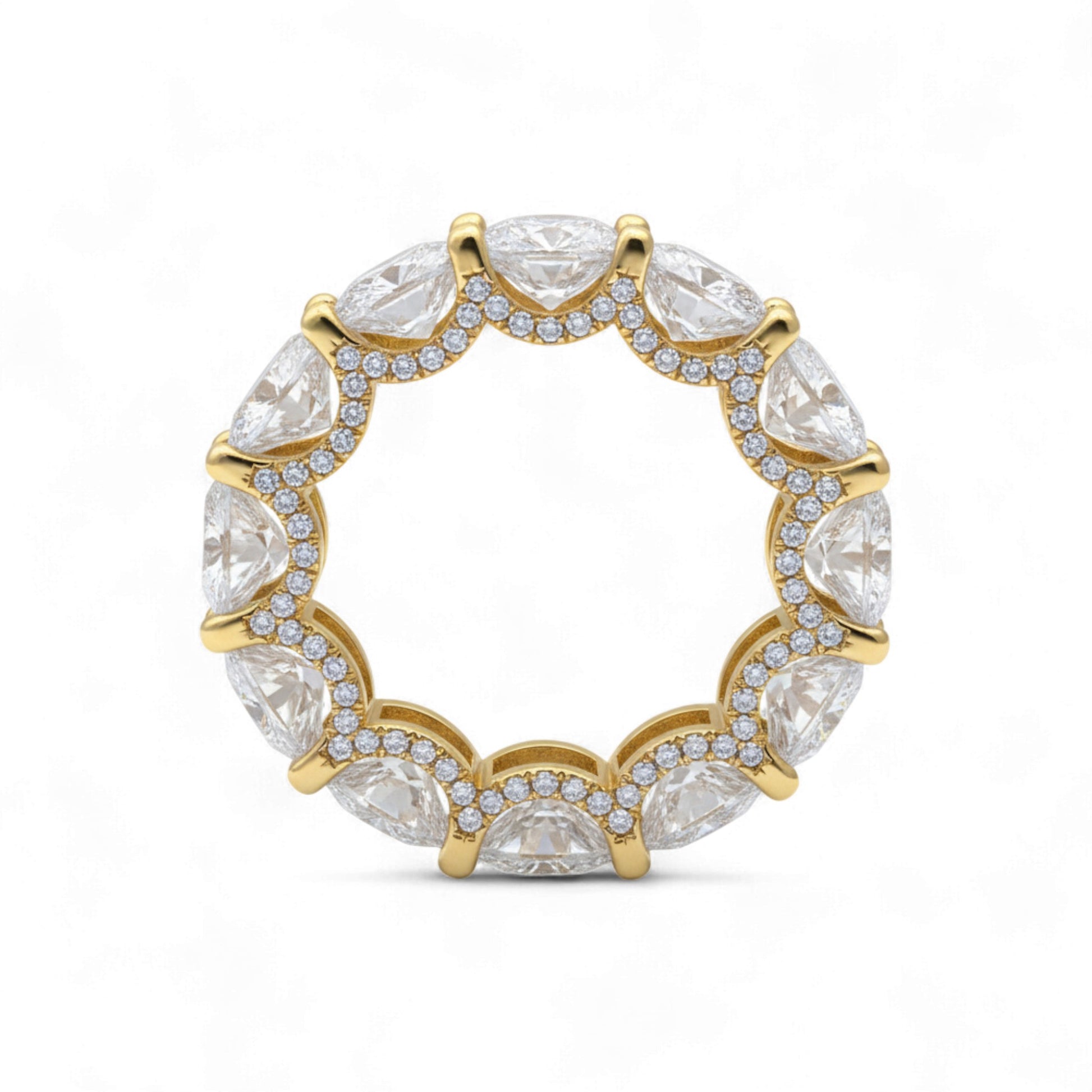 Gold ring with clear gemstones on a white background