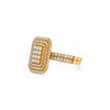 Gold ring with diamond accents on a white background