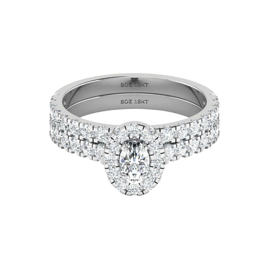 Diamond ring with 'BOZ' engraving on a white background