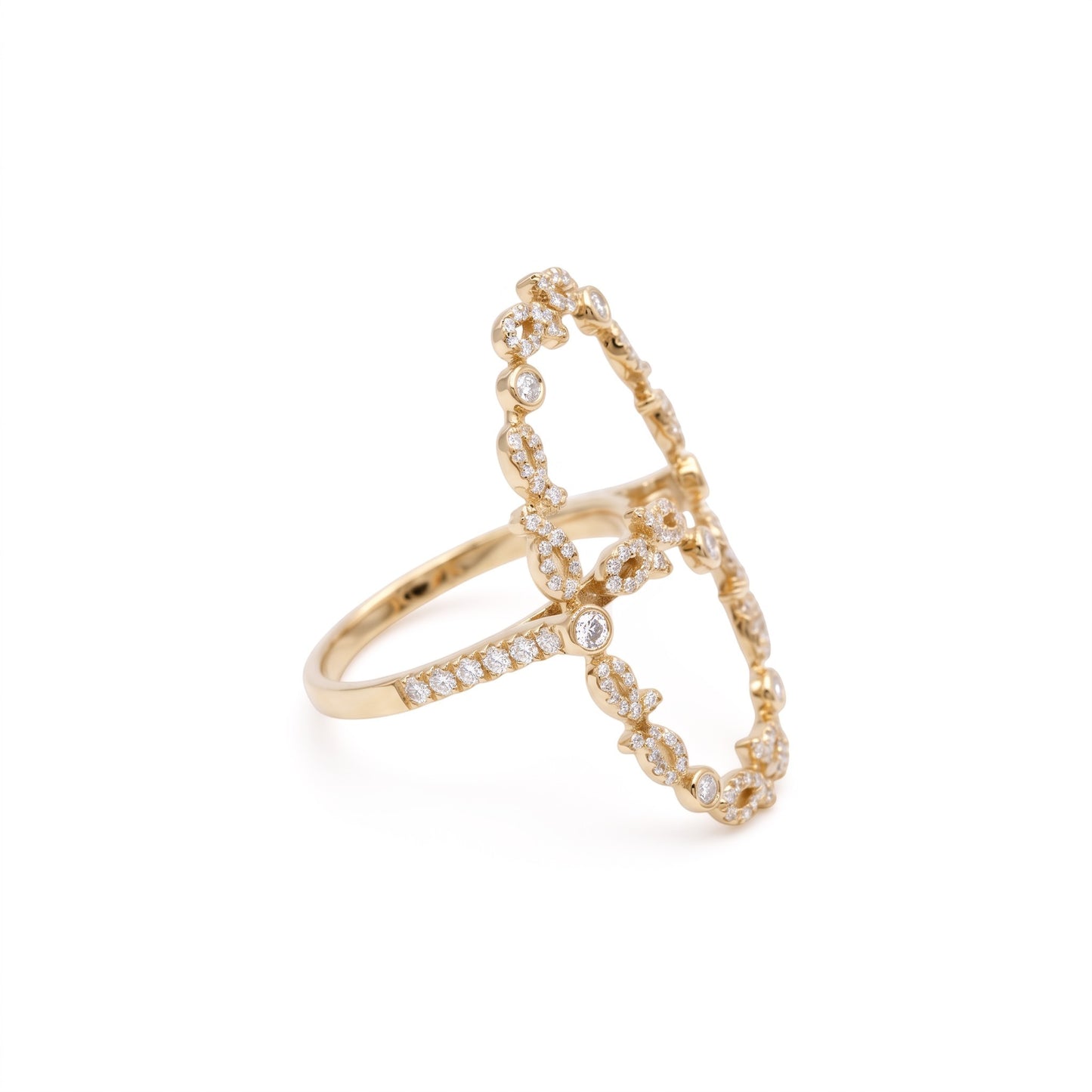 A gold ring featuring an open, geometric design paved with small clear stones, shown on a plain white background.