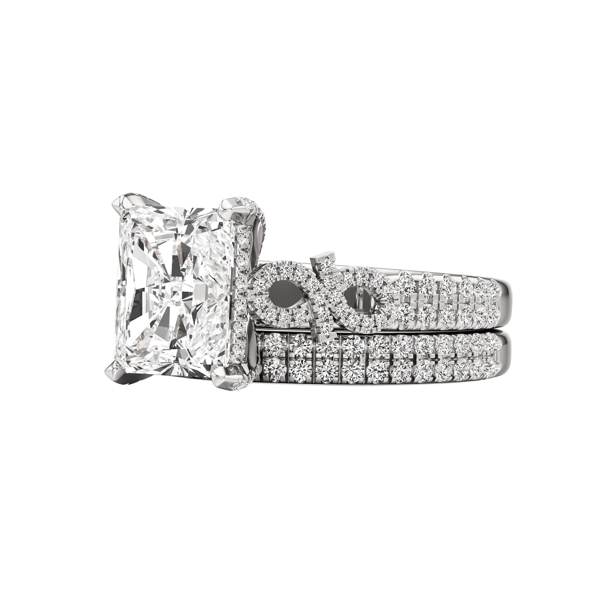 Diamond ring with a matching band on a white background