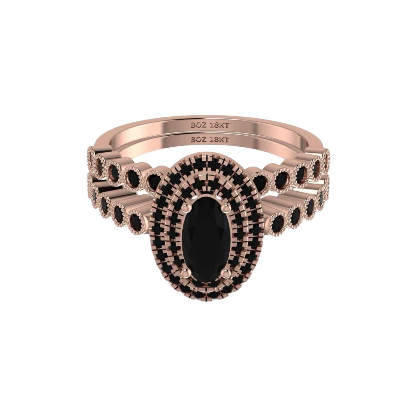 Rose gold ring with black gemstone on a white background