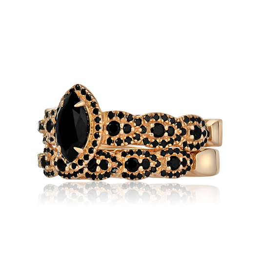 Gold and black ring on a white background