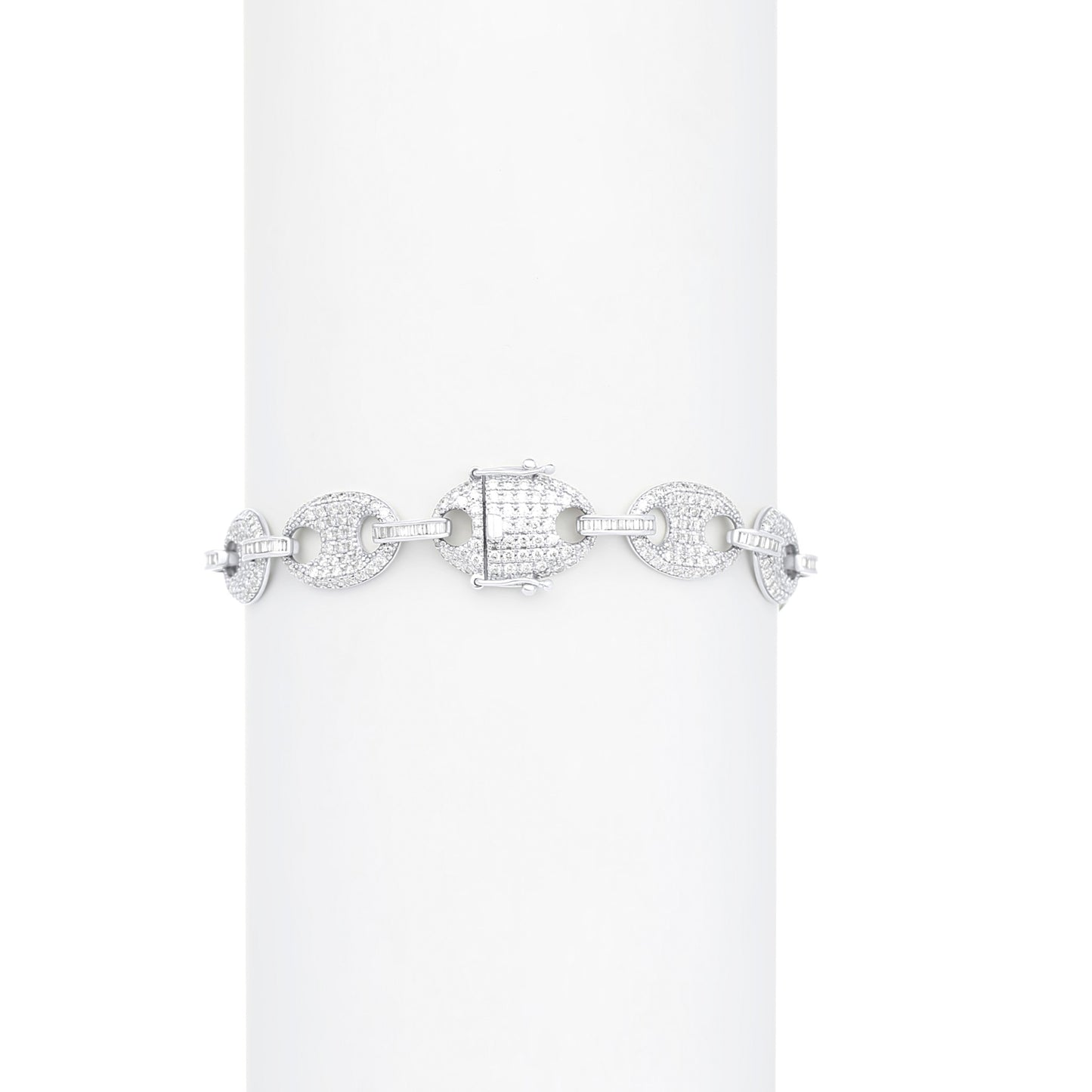 Silver bracelet with clear stones on a white background