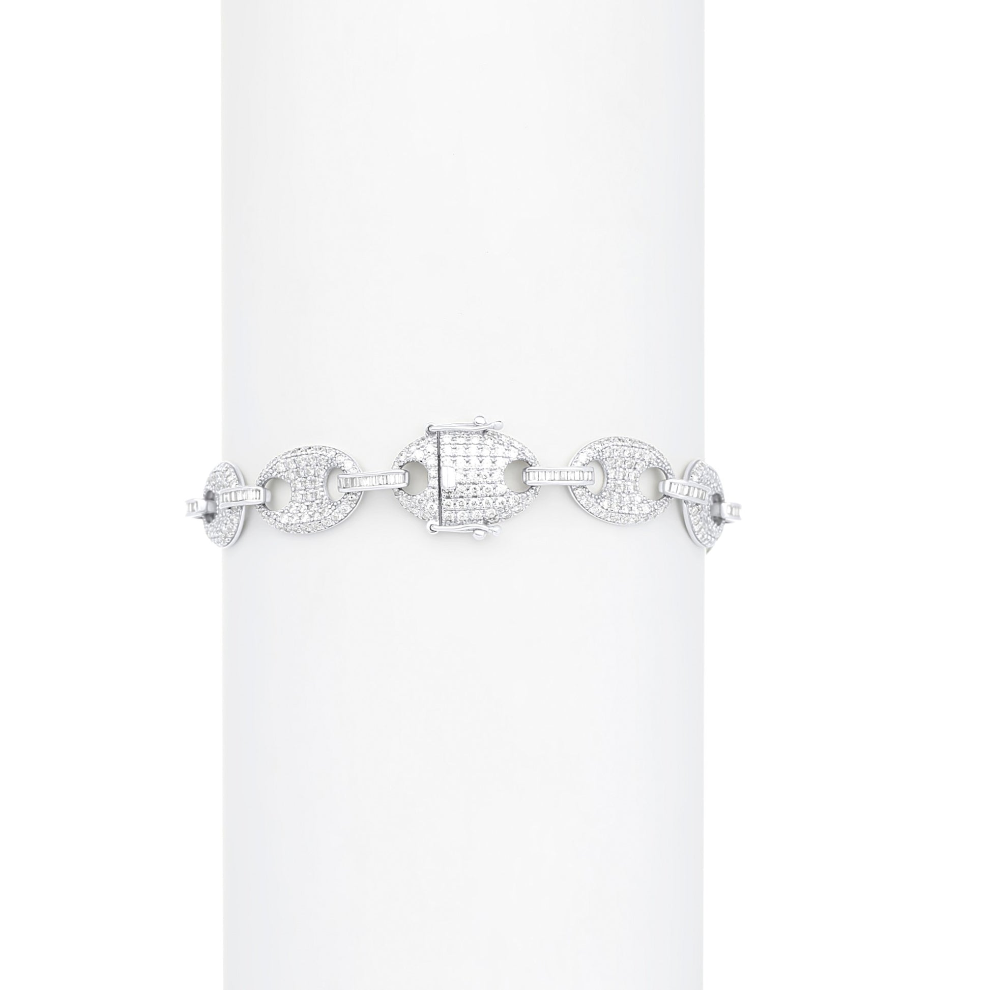 Silver bracelet with clear stones on a white background