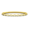 Gold bracelet with a wavy design on a white background