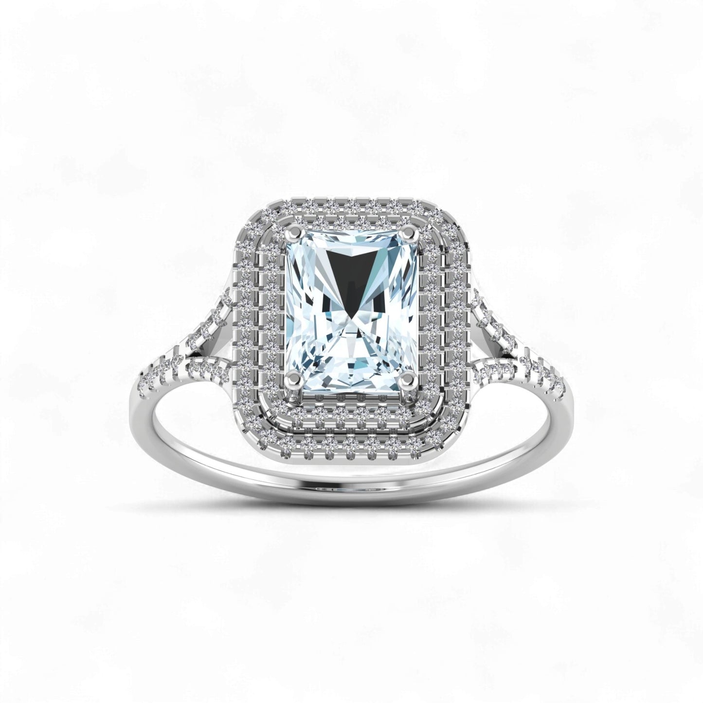 Silver ring with a large central gemstone and smaller stones on a white background