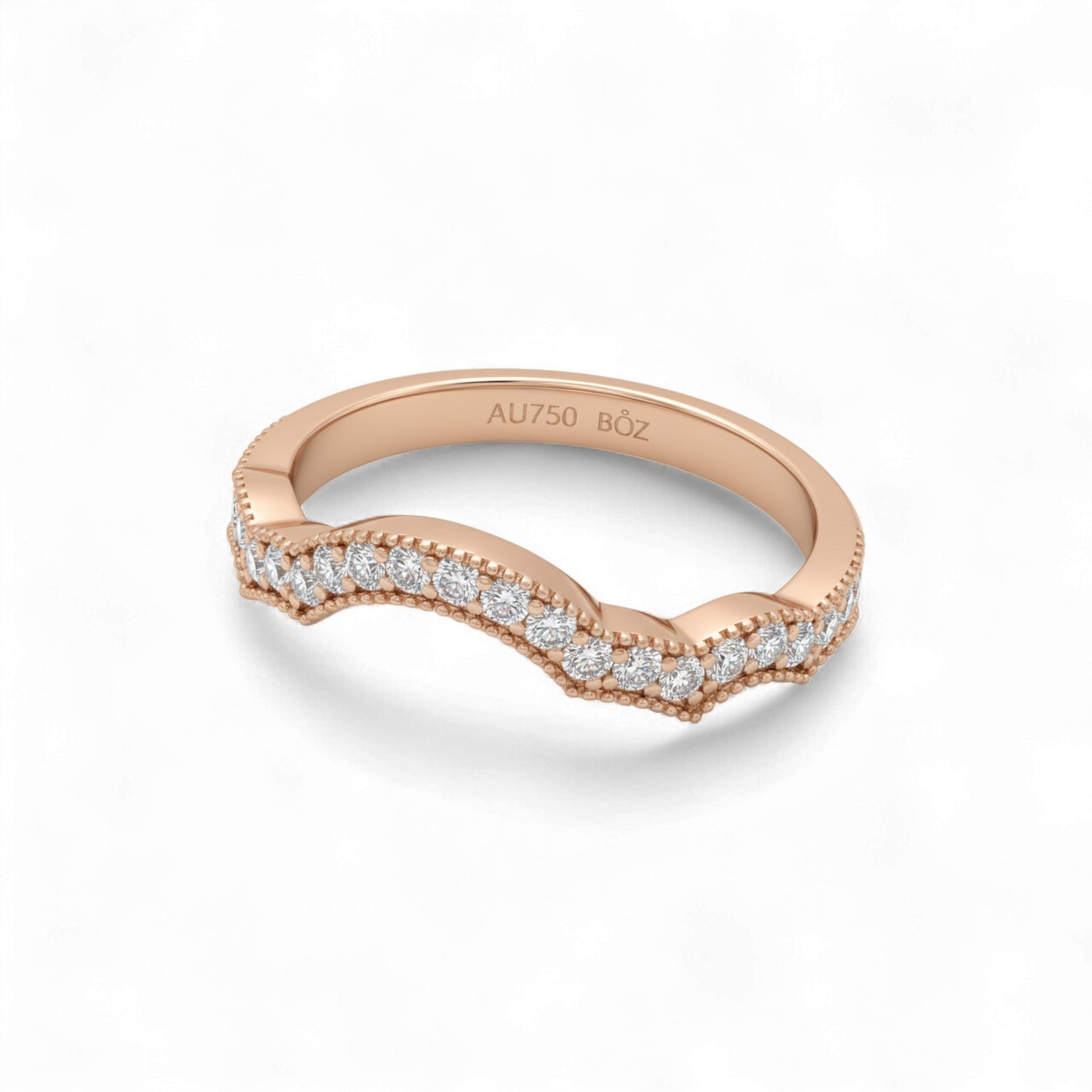 Rose gold ring with diamonds on a white background
